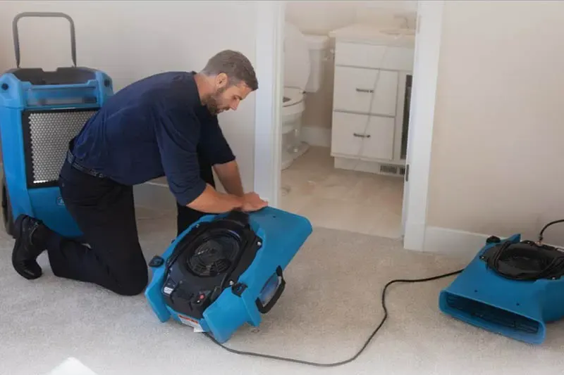 Great South Bay Water Restoration technician on a Bay Shore water damage job